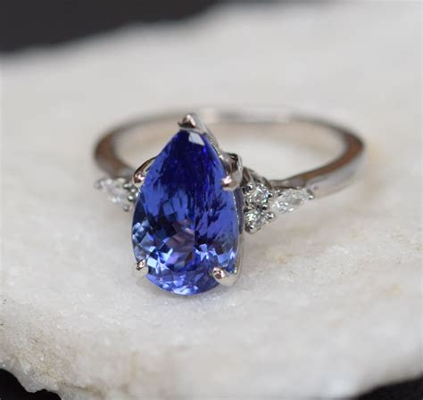 From setting a budget to picking a jeweler to learning the four c's, we walk you through the various steps of finding the perfect engagement ring. Tanzanite Ring. White Gold Engagement Ring 3.3ct Lavender