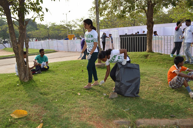 New Trend Smart, handsome, trendy and well educated turn as voluntary garbage collectors to collect trash to keep up events clean and tidy