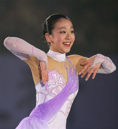 图文 花滑美女浅田真央写真美女紫色比赛服 搜狐体育
