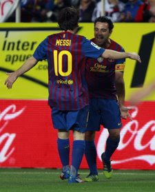 Xavi Y Messi