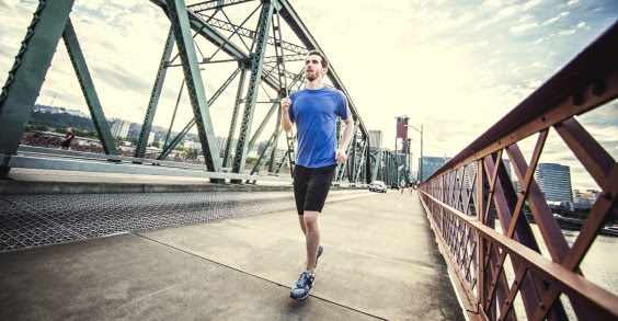 Man Running Over Bridge