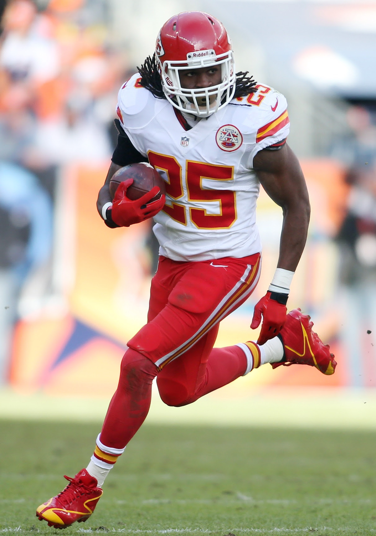 Jamaal Charles turns the corner and rushes upfield