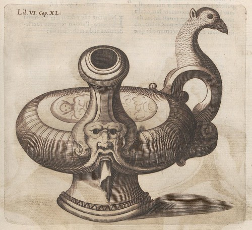 engraved design of oil lamp or candleholder with birds head and a grotesque