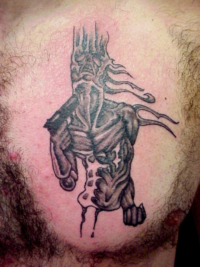 Suicide - chest tattoo