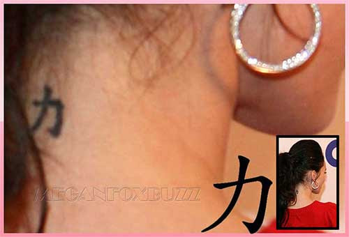 seen sporting a new tattoo going down the left side of her back while.