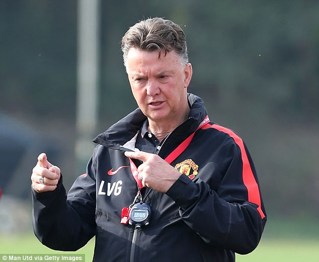 Van Gaal, pictured taking training at Carrington on Friday, would love to see Ronaldo back at United