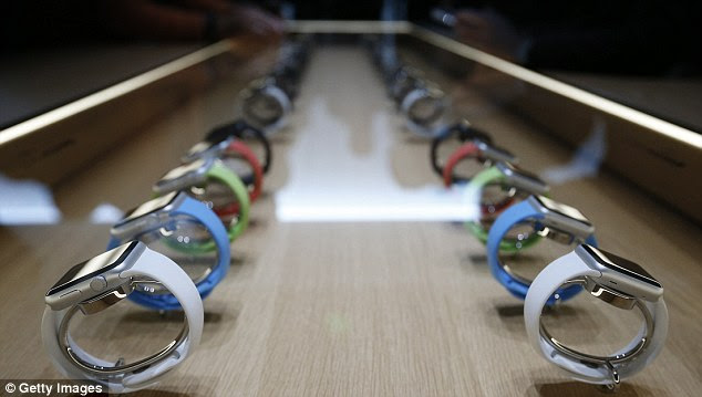 Apple will install special tables in its stores to allow people to see and try on the Apple Watch 