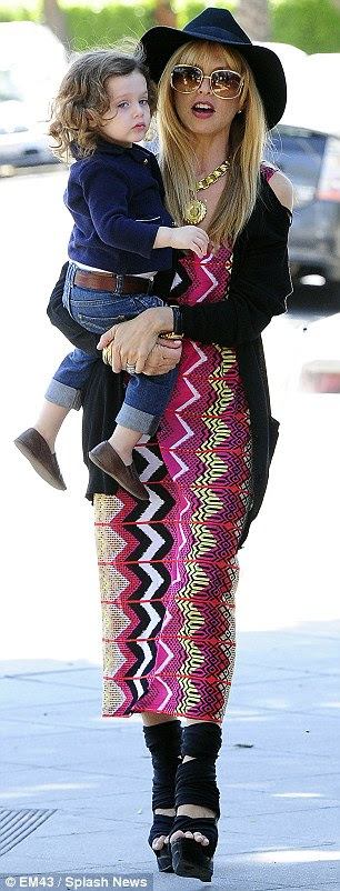 We are family: The stylist was joined by her husband Rodger Berman for the outing
