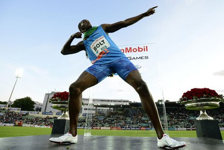 Usain Bolt doing his best Hulk Hogan pose (Reuters)