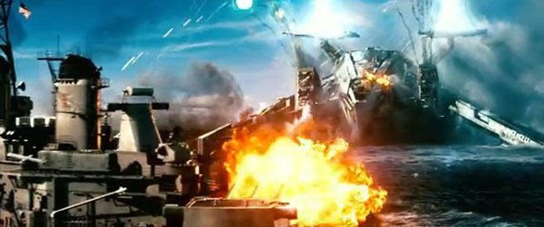 A U.S. Navy cruiser fires away at a giant alien spacecraft in BATTLESHIP.