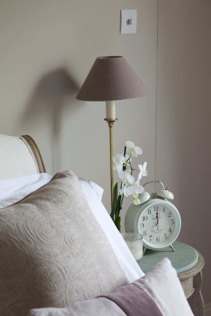 Farrow + Ball Elephants Breath paint in bedroom. Fabrics from fox linton and gp & j baker.