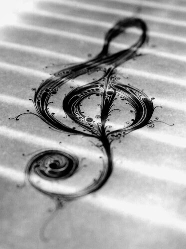 treble clef tattoo designs. treble clef scan