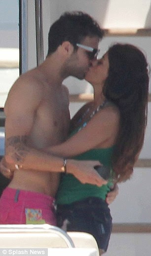 Time for themselves: The couple carried on their smooching on board the yacht, making a secret escape from the others