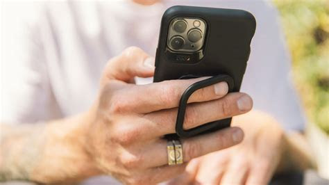 Open the charging port cover at the left of handle. mophie Juice Pack Connect portable wireless charger adds