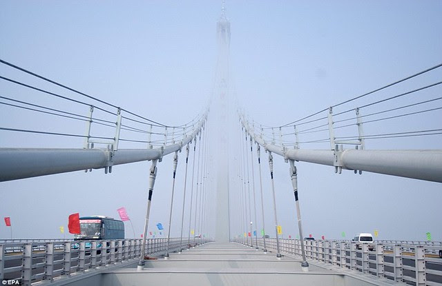 That is a £1bn bridge too far World's longest sea bridge opens to traffic in China... but it will only hold the title for five years 8