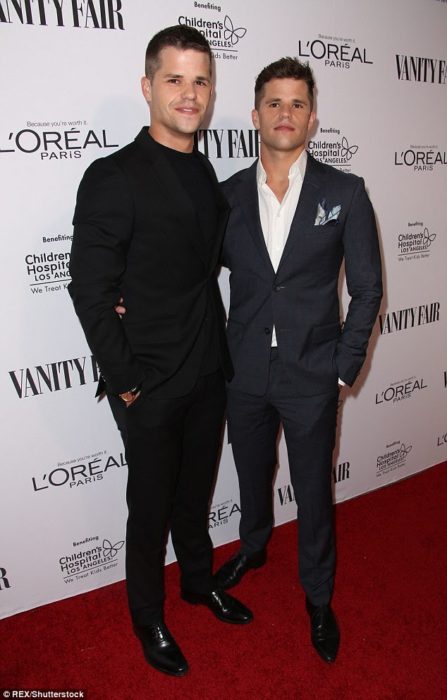 Handsome: The hunky twin brothers, 27, chose well-cut suits to showcase their gym-honed physiques