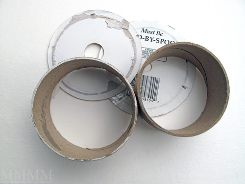 Step 1a) Find two old ribbon spools and remove their labels leaving just the cardboard rings -or left over spools from packing tapes would work nicely
