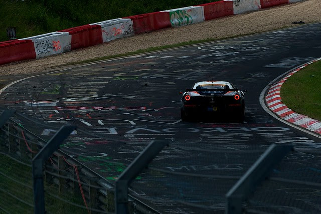 Another shot of the Ferrari 458 Italia GT 2 braking Another shot of the Ferrari 458 Italia GT 2 braking
