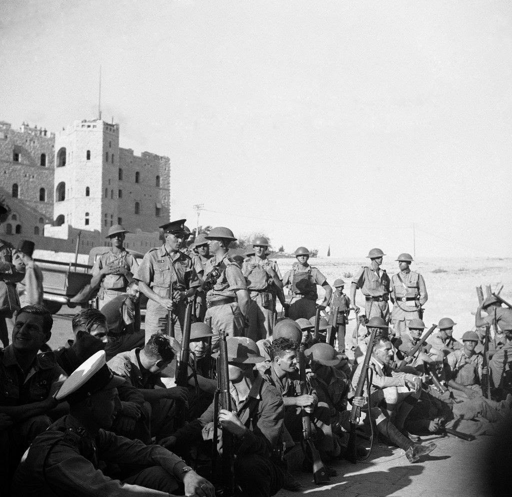 British captors of Old Jerusalem await fresh military orders ourside the Damascus Gate through which they penetrated the lines of the Arab rebels. (AP Photo/James Mills) Ref #: PA.14567790 Date: 31/10/1938