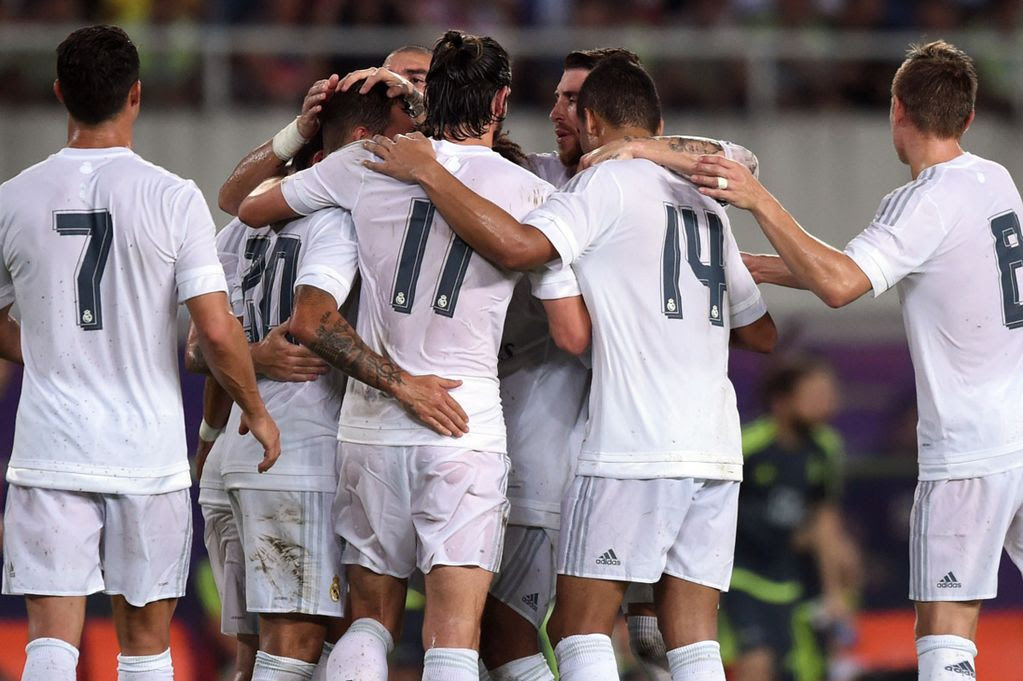 Real Madrid's players celebrate Jese's goal