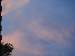 sun is starting to set; clouds are turning pink