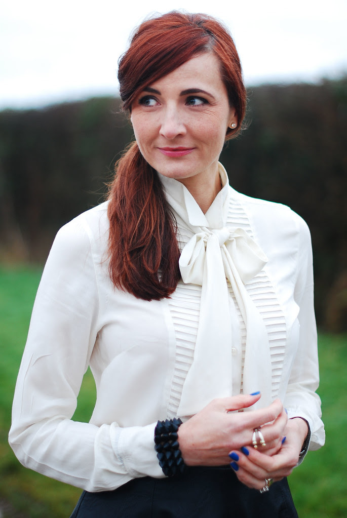 Cream ruffled blouse
