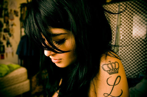 woman shoulder tattoo