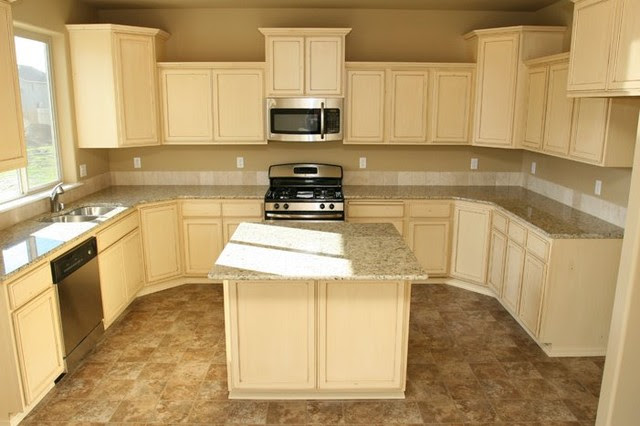 New house...Distressed white Cabinets