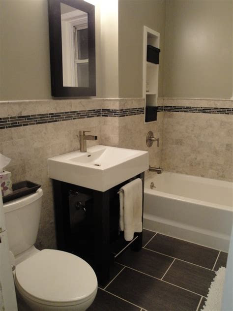 The pharmacy vanity from restoration hardware has nice splayed legs that reveal a lot floor beneath them. Marble Subway Tile Bathroom - Contemporary - Bathroom