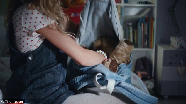 Because I'm easy come, easy go: The bear's life is about to change as he's stuffed into a bag to take away