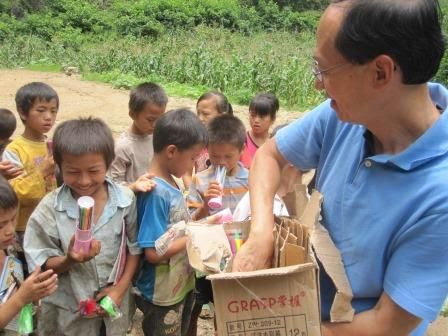 Eddy Wu from Hong Kong gave out art supplies.