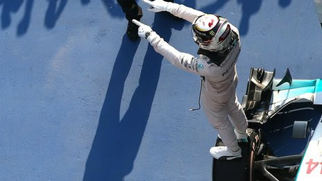 Lewis Hamilton celebrates victory