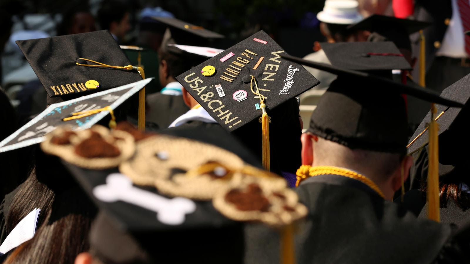 An adorned graduation cap saying, “USA and CHN” at The City College of New York commencement ceremony in Manhattan on May 31, 2019.