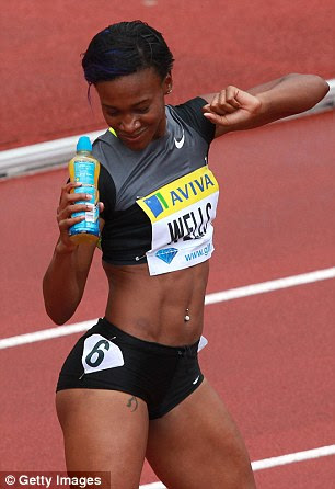 Victory dance: Wells will hope to replicate her victory at the Olympics