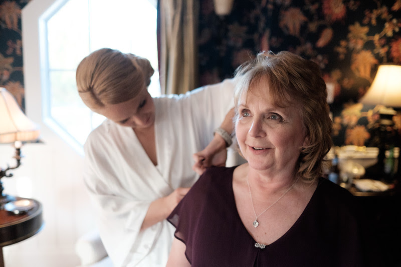 Preparations and pre-ceremony photography at Copperstone Inn before Mallory & Rob's winter wedding at the Pavilion at Orchard Ridge Farms near Rockford, IL. Wedding photographer– Ryan Davis Photography – Rockford, Illinois.