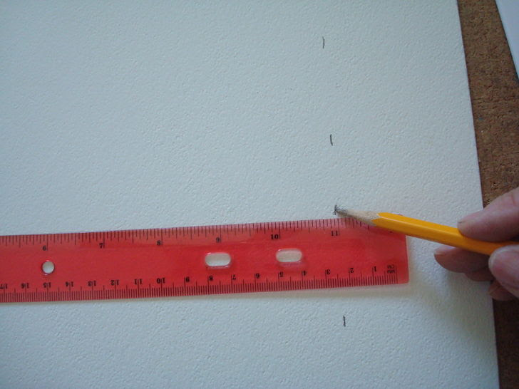 Pencil mark the mat.jpg