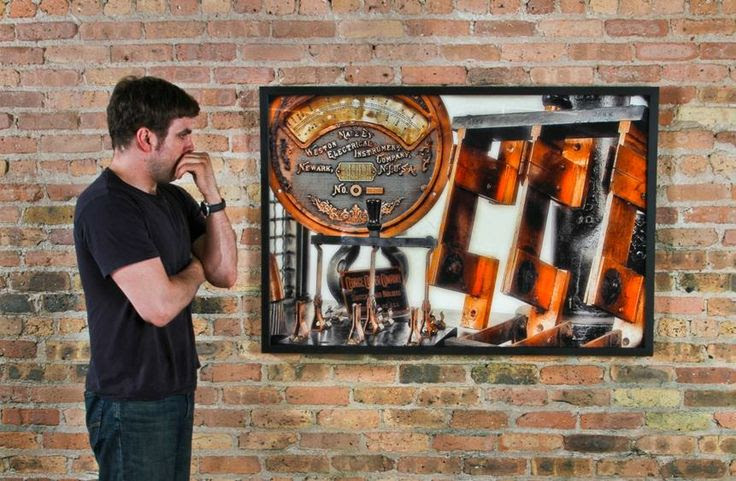 Photo of Eric J Nordstrom with a framed photograph. #photoception # ...