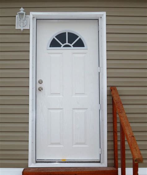 Adding glass panels to your front door can provide a new look and let more light into a living room or foyer. HomeOfficeDecoration | Exterior steel doors