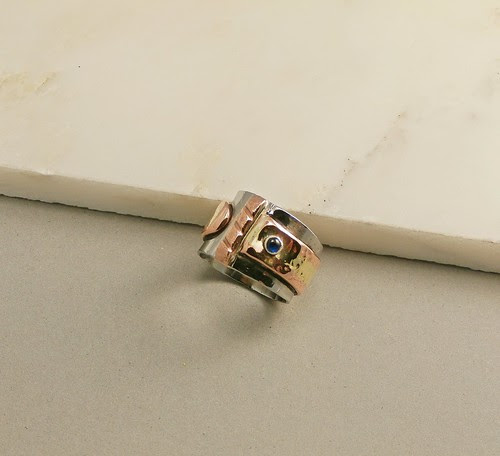 ring stainless steel, copper brass fused, Spinel synth 3mm, size 8 by Wolfgang Schweizer