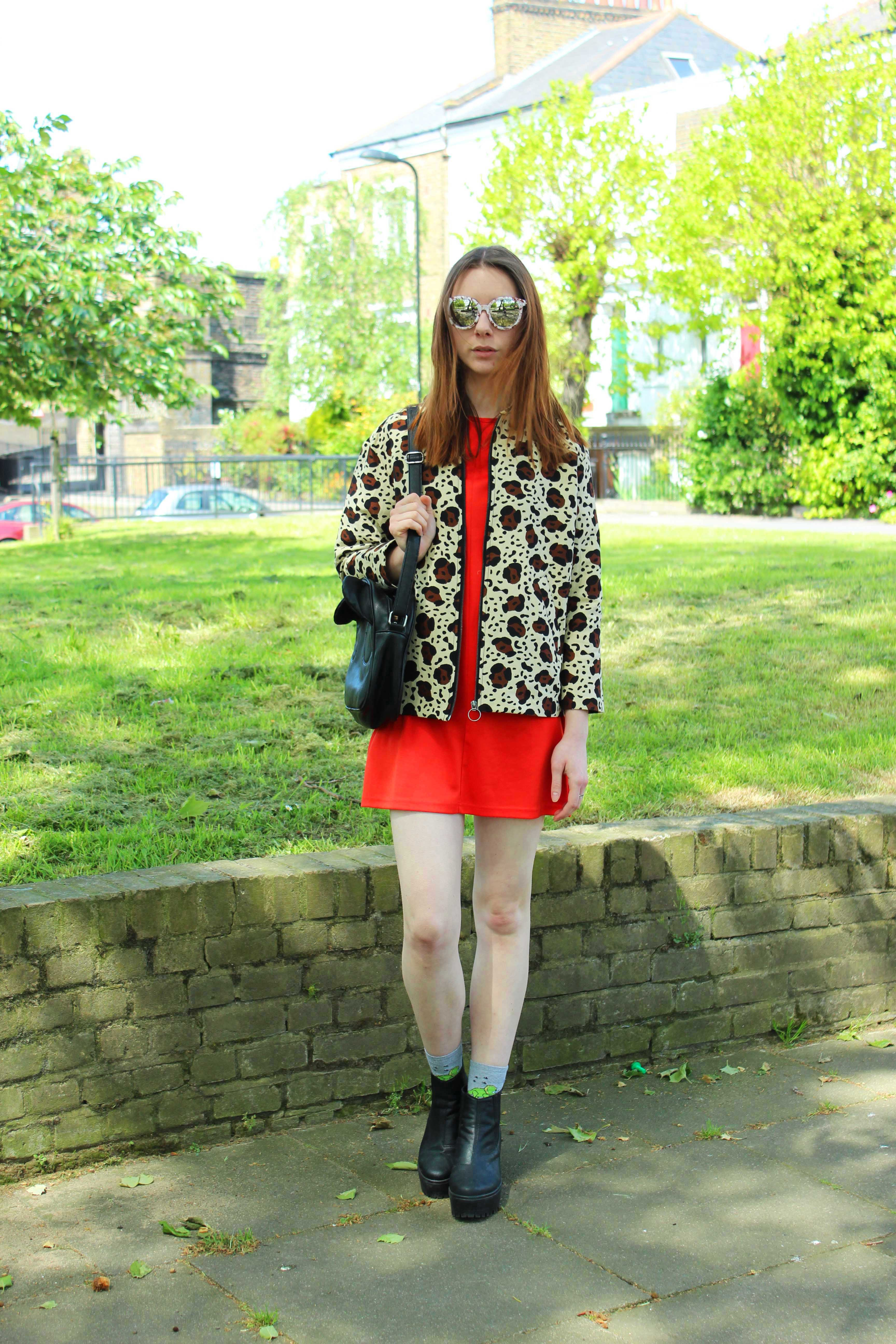 Outfit with leopard jacket, orange tunic and boots