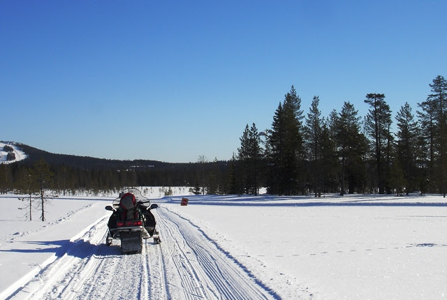 Snowmobile on frozen lake in Finland Scandinavia