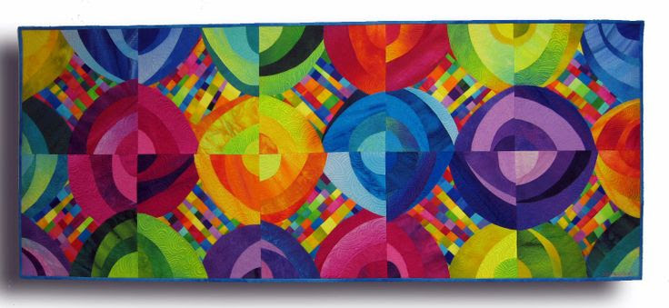 Ringscycle ll, hand dyed cottons and silks, fused, machine quilted. 53.5x22“ $1000