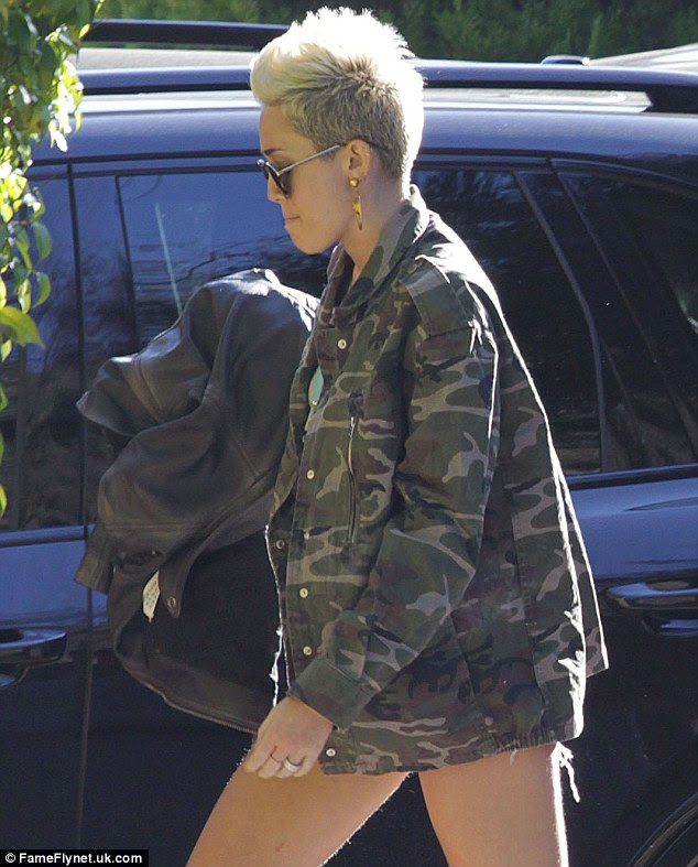 Covering: Later the actress slipped on an Army jacket 