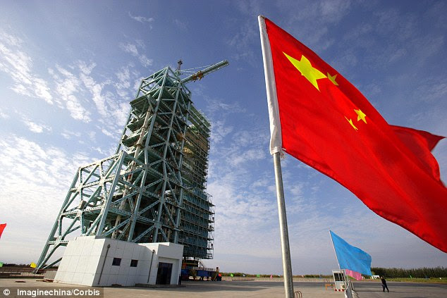 A paper by a national security expert claims that China has used performed anti-satellite tests. In 2007 China infamously shot down one of its own weather satellites in a test, creating thousands of new pieces of space junk in orbit. Pictured is a view of the space rocket launch pad at the Jiuquan Satellite Launch Center, China