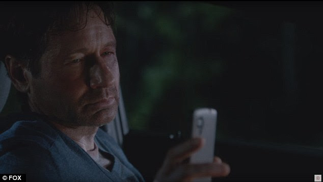 It's ringing: A battered and bruised Fox Mulder, played by Duchovny, is seen ignoring a phone call from Dana Scully in the teaser promo for the final sixth episode of the X-Files reboot, that airs Monday