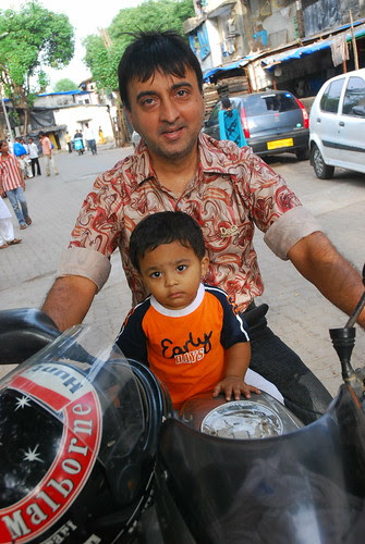 Raju Shresta And His Son At Bandra Bazar Road by firoze shakir photographerno1