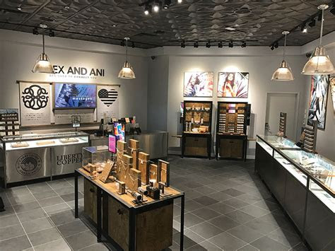 Alex and ani tiger head charity by design shiny gold charm bangle with tag, meaning card, and alex and ani box. ALEX AND ANI to open regionâs first stand-alone store at