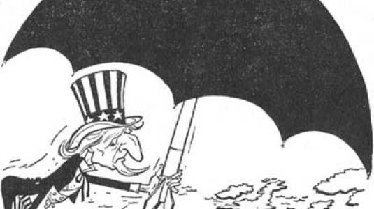 Αμερικανική γελοιγραφία του 1947. Παρουσιάζει το μπάρμπα Σαμ να προσφέρει ομπρέλα προστάσίας στην Ευρώπη. Η ομπρέλα, όμως, κρύβει μια βόμβα... 