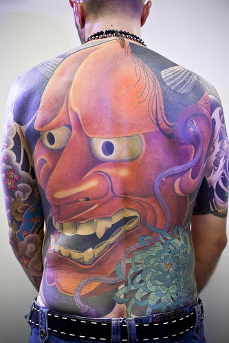 The fad of permanent tattoo at back