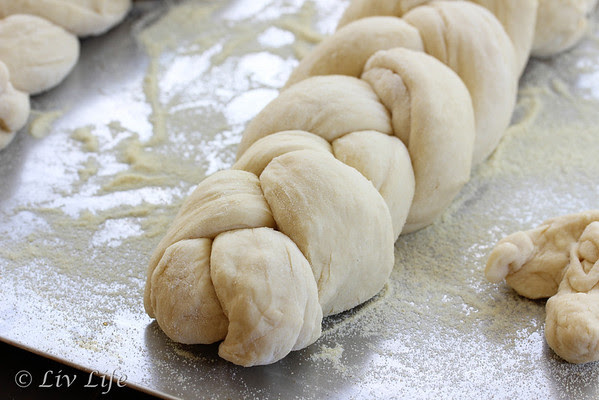 Dough for Holiday Bread Braid rising on a bakin sheet